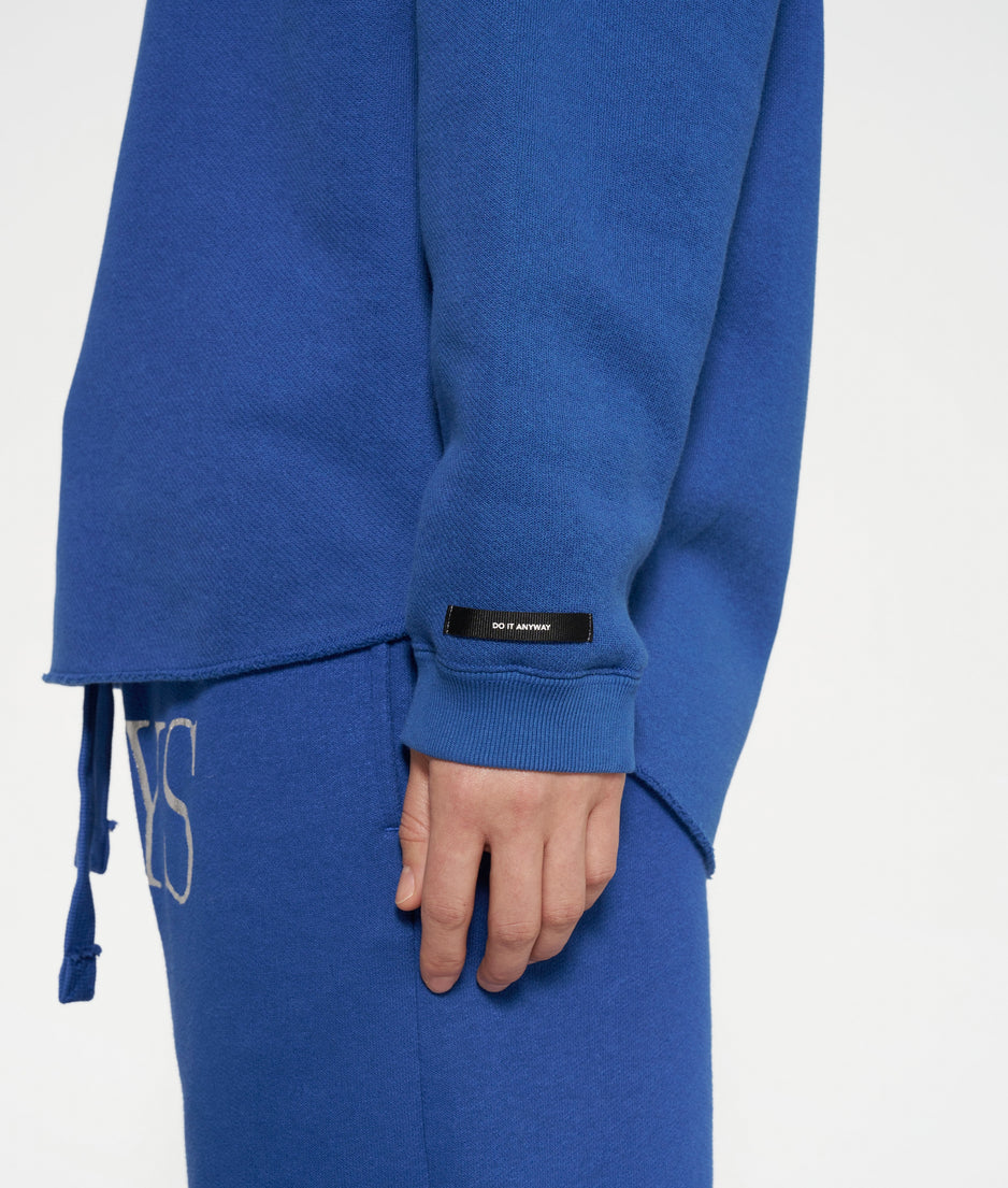 raw edge statement sweater | true blue