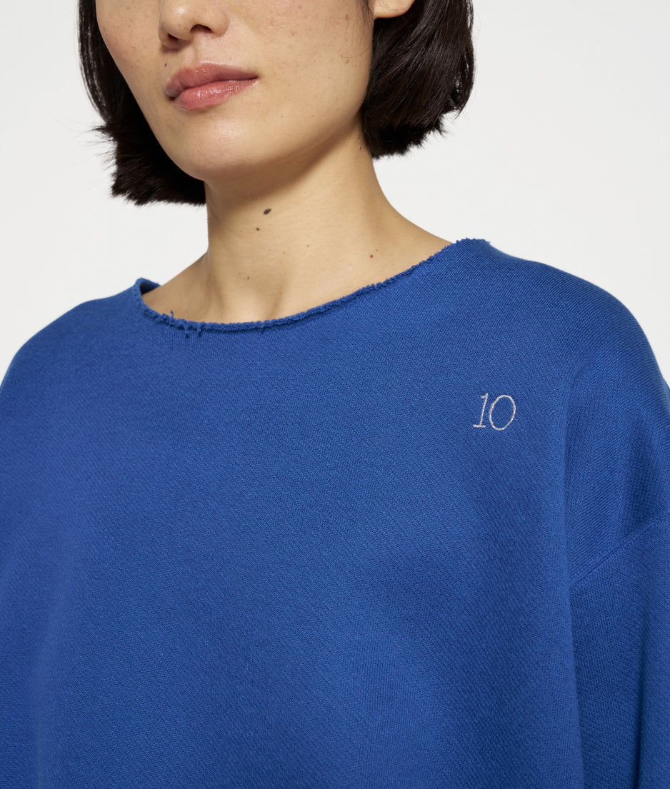 raw edge statement sweater | true blue