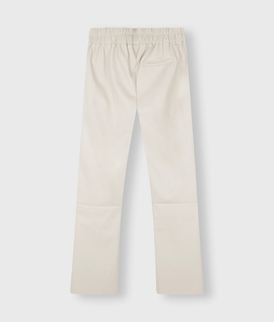 leather look flared jogger | light safari