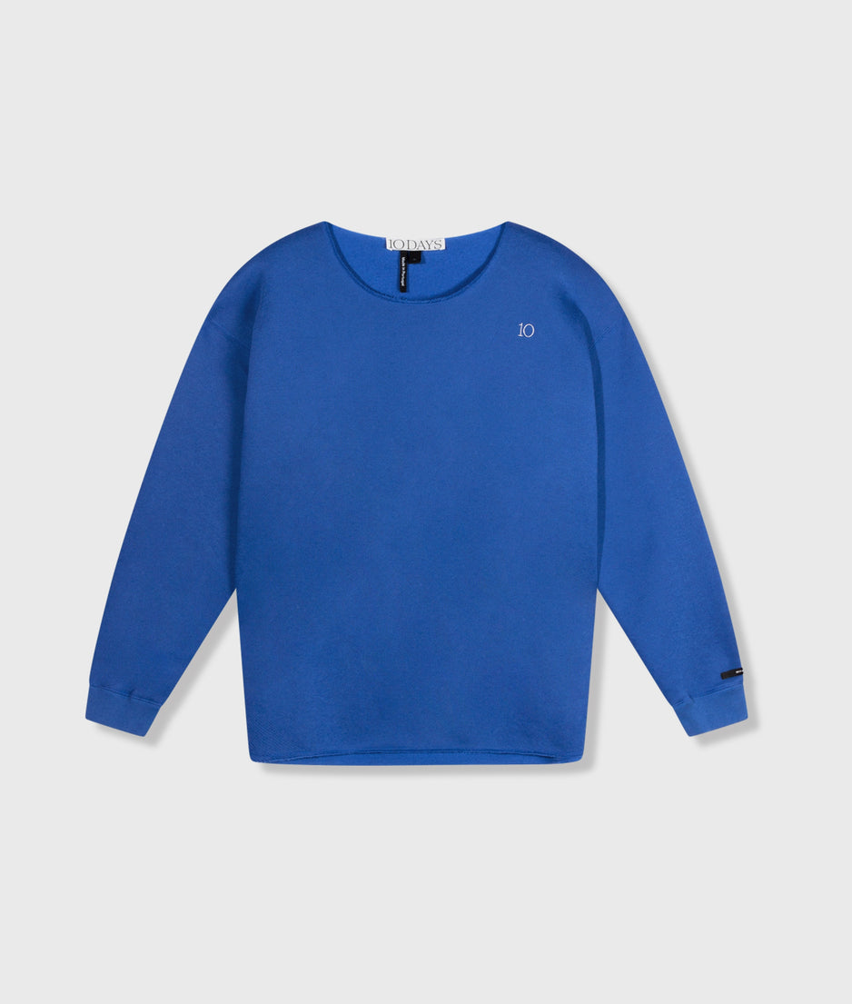 raw edge statement sweater | true blue