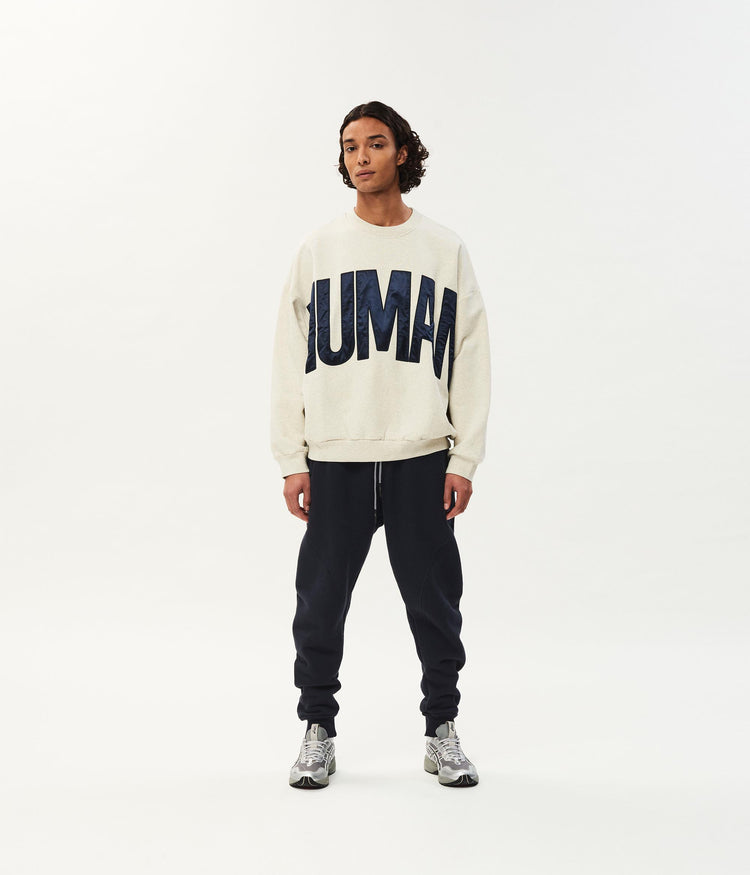 Human fleece sweater | soft white melee