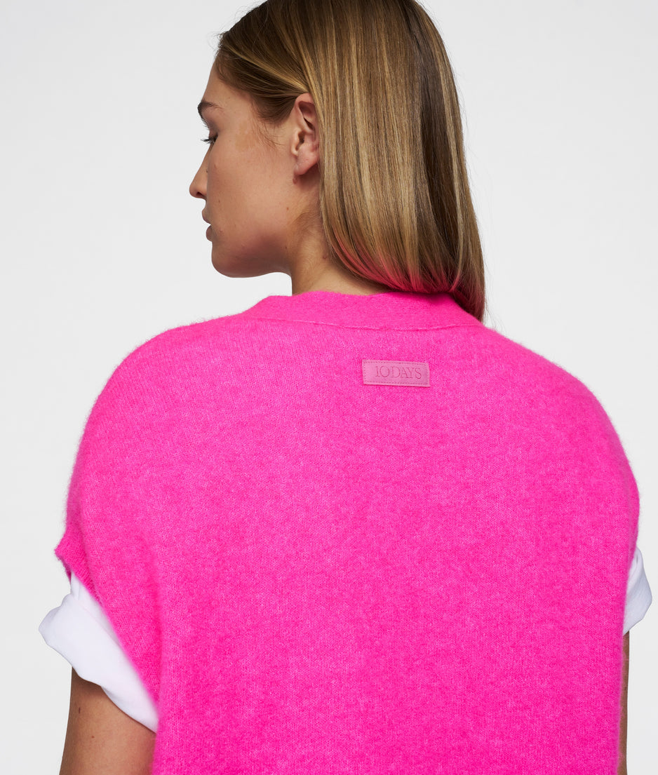 knit gilet | neon pink