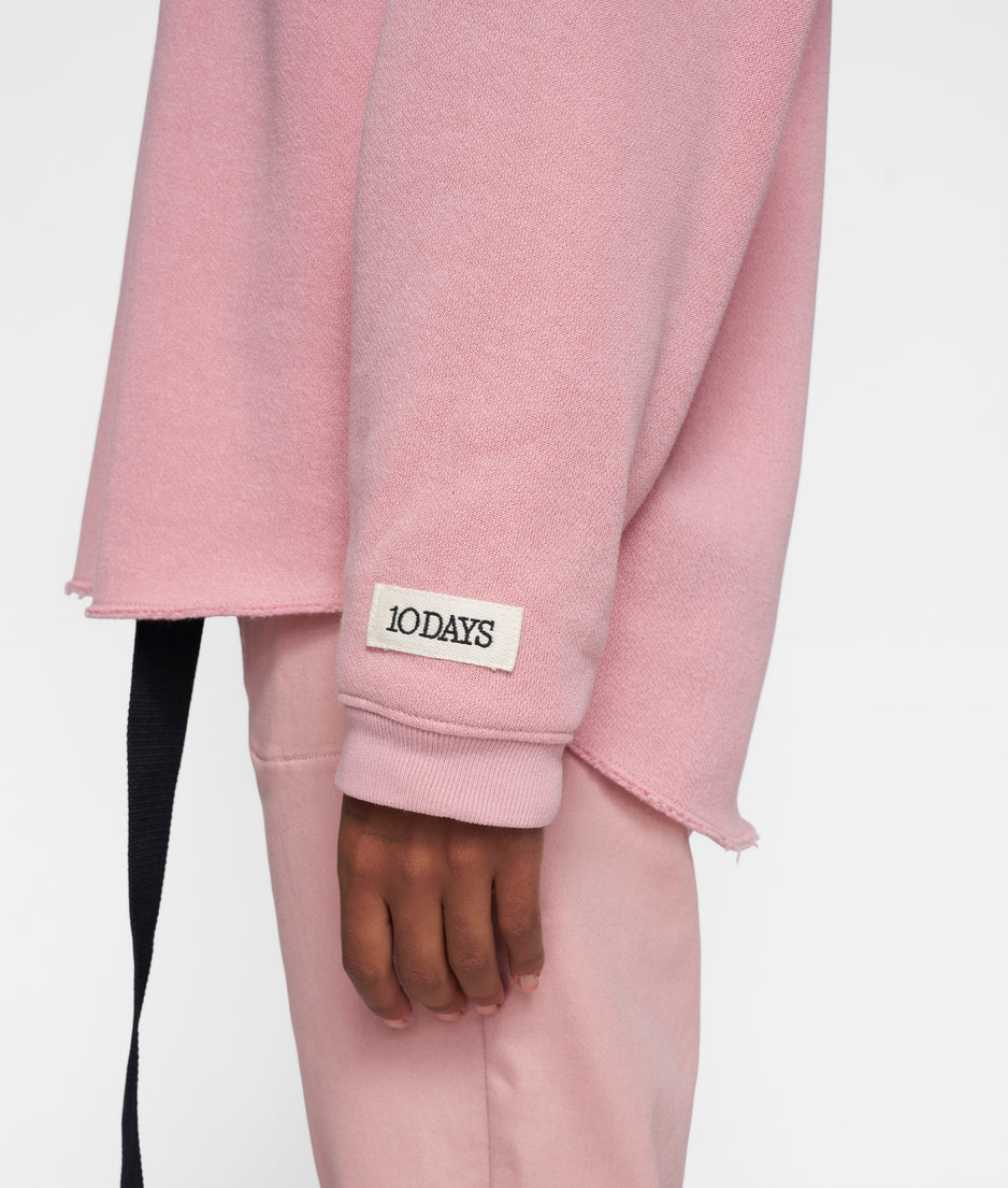 raw edge statement sweater | raspberry