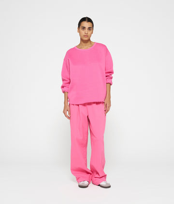 raw edge sweater | bright pink