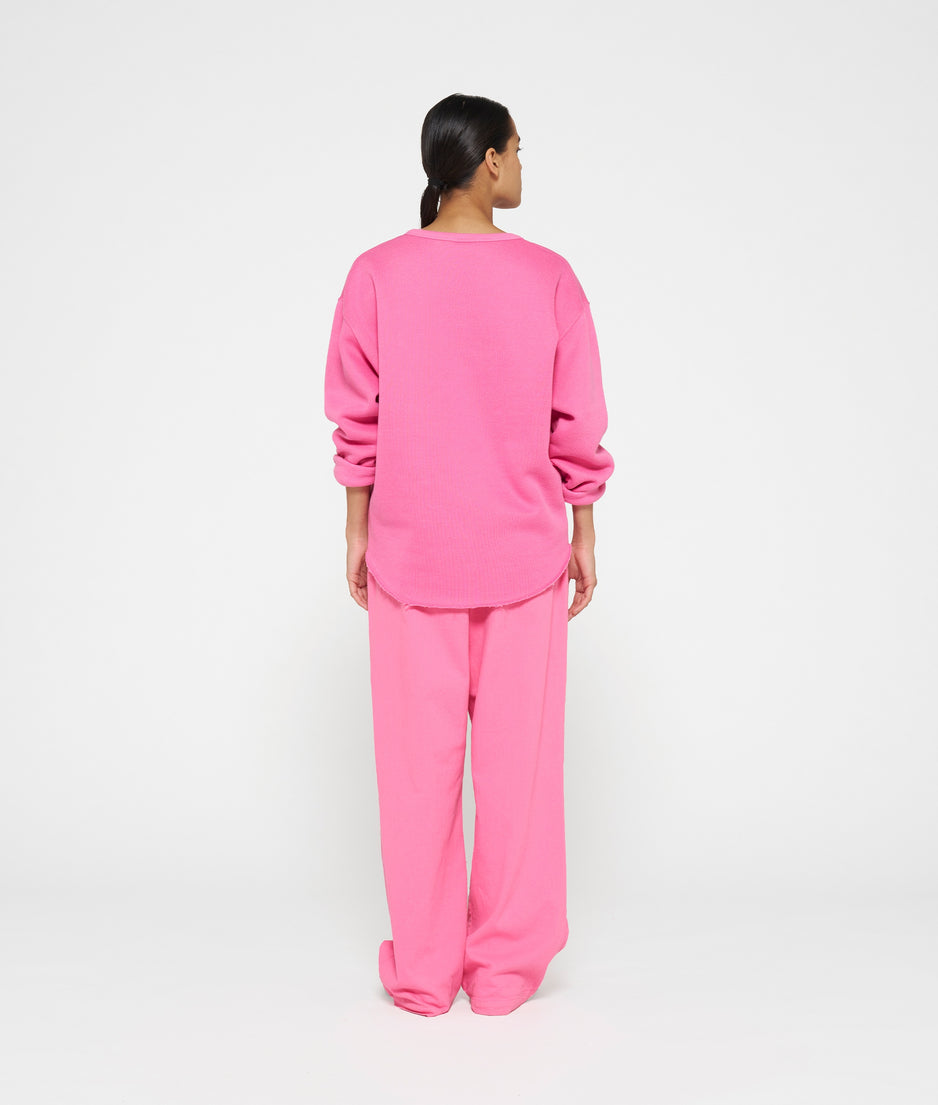 raw edge sweater | bright pink